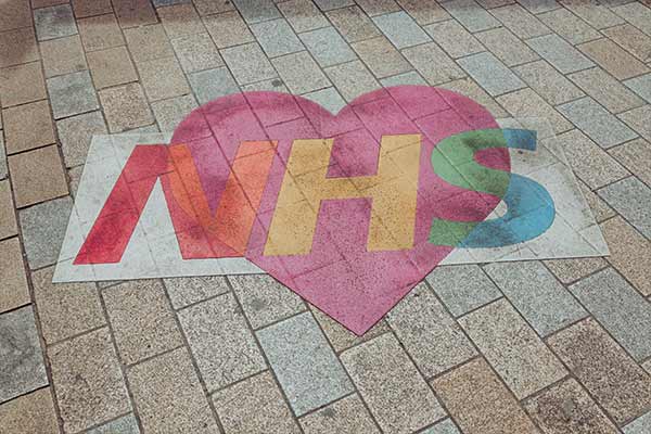 NHS Logo on Pavement